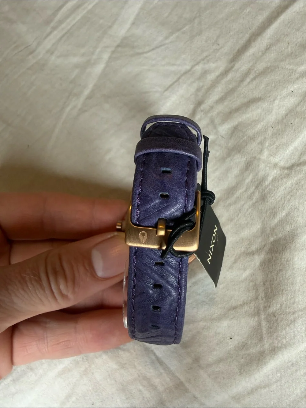 Nixon women’s purple Dial Leather Strap Watch